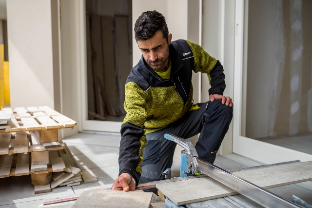 Handwerker in Arbeitskleidung von Kapriol