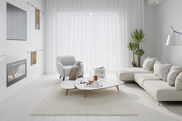Wohnzimmer mit weißen Möbelstücken