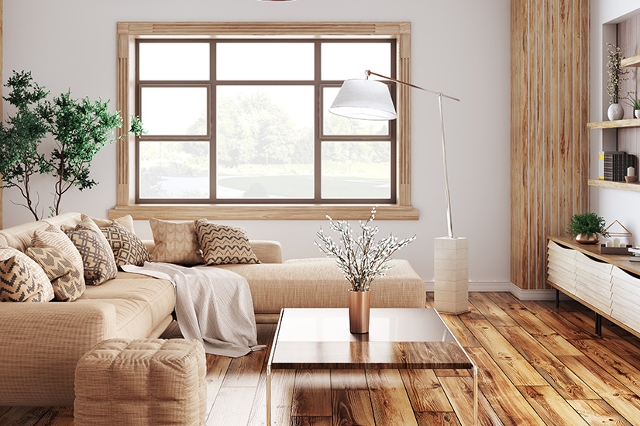 Modernes Wohnzimmer mit weißen Wänden und beige/braunen Möbelstücke